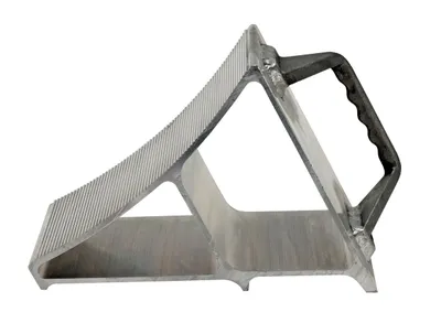 Vestil EALUM-7-HNDG aluminum wheel chock shown from an alternate angle