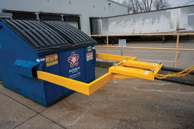Vestil FLDM-2-72 fork mounted front load dumpster mover shown from an alternate angle