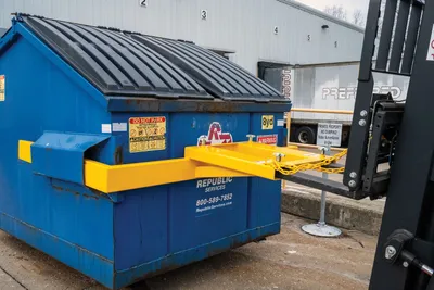 Vestil FLDM-2-72 fork mounted front load dumpster mover shown from an alternate angle