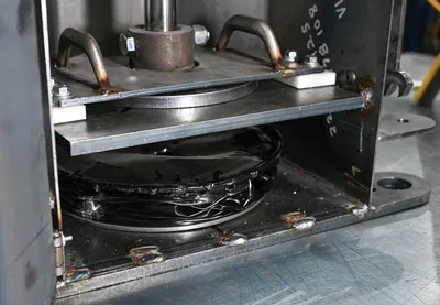 Vestil HPC-405 hydraulic pail crusher shown from an alternate angle