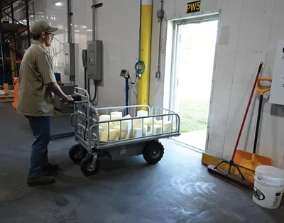 Vestil OROAD-1000-T off-road traction drive powered cart shown from an alternate angle