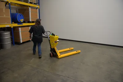 Vestil PM5-2748-Y-UP-001 pallet trucks with p-caddy shown from an alternate angle