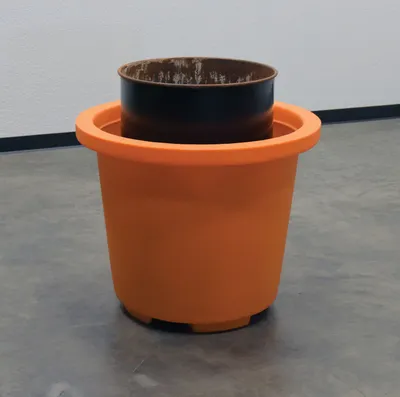 Vestil SCC-65-OR overpack container shown from an alternate angle
