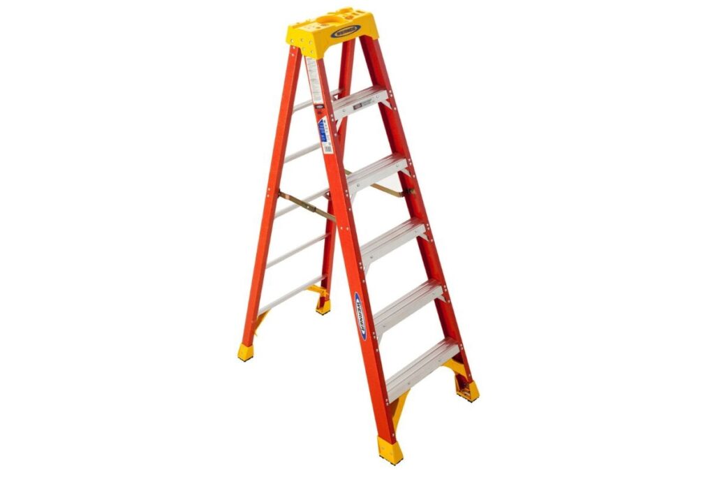 A Frame ladder providing safe access to high shelves in a warehouse